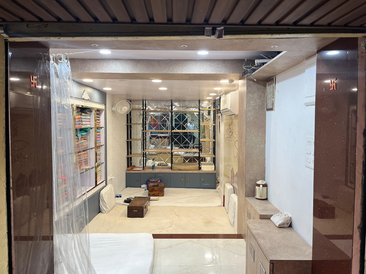 A traditional gaddi in a Banarasi saree wholesale boutique